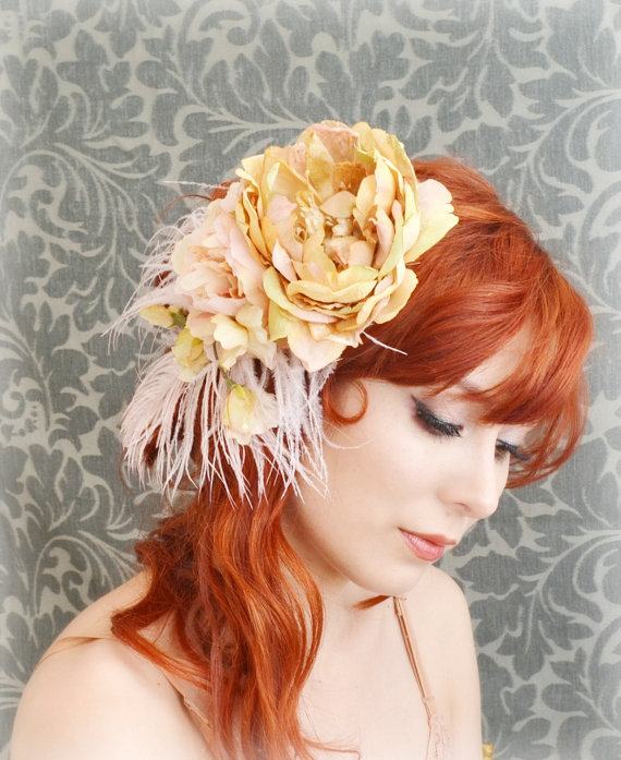 a close up of a person with a flower in her hair