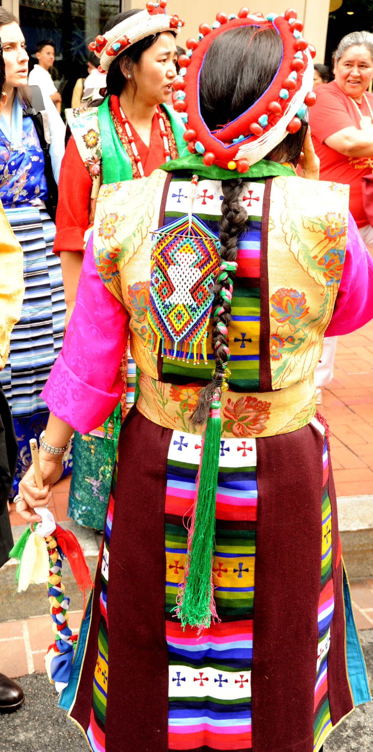 some women are dressed in colorful clothing