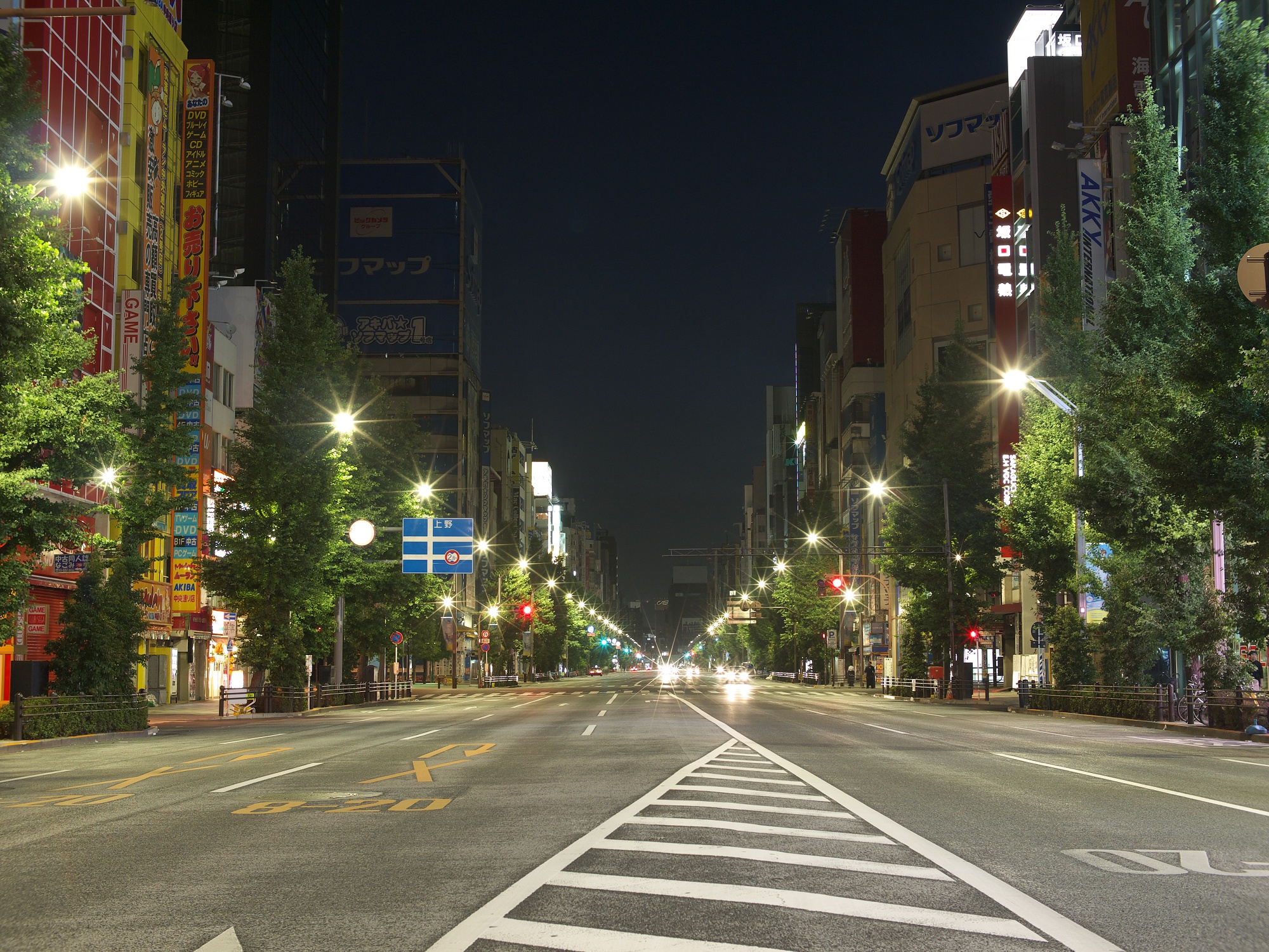 the empty street has signs on both sides