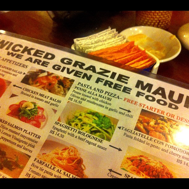 an opened menu that has a meal displayed