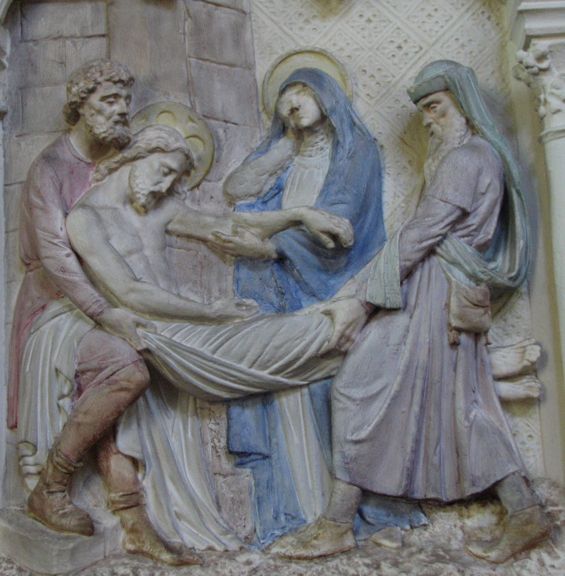 this is a sculpture in the wall of a church