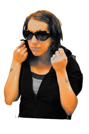 a young woman with sunglasses making a gesture