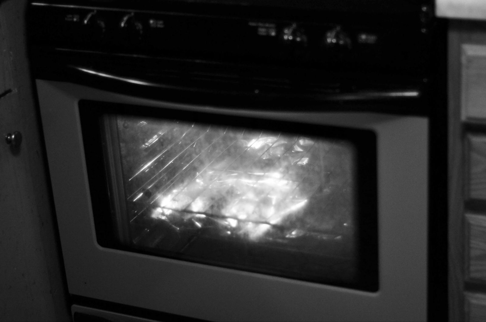 an oven is shown with the door open