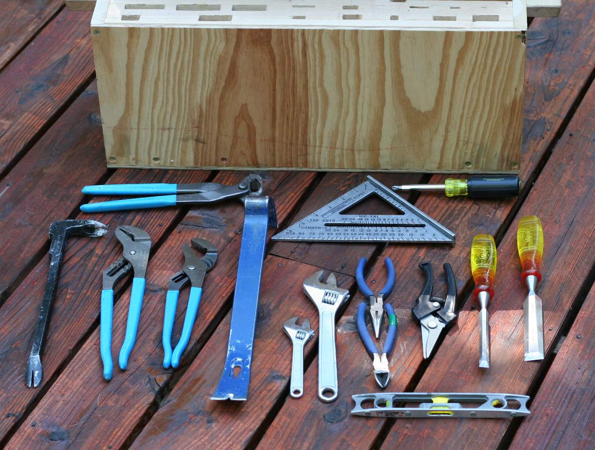 the tool kit has several different tools, including wrench, pliers and other bits