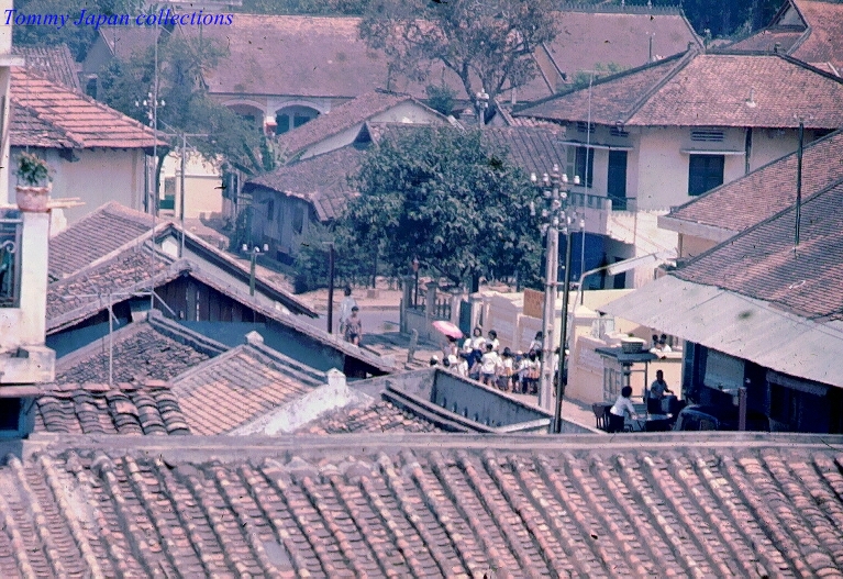 the rooftops of several different houses are seen