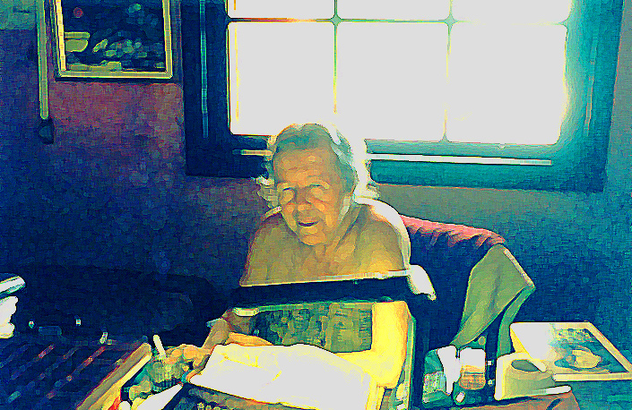a woman sitting at a table and making notes