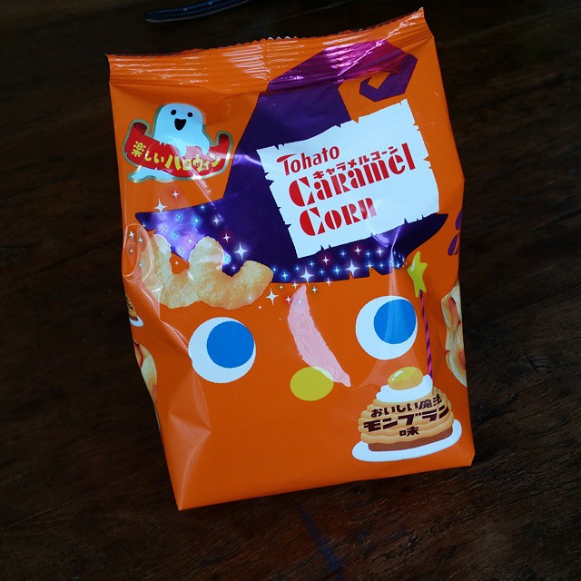 an orange bag with lots of cookies in it