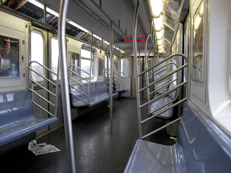 empty subway car with the seat back facing forward