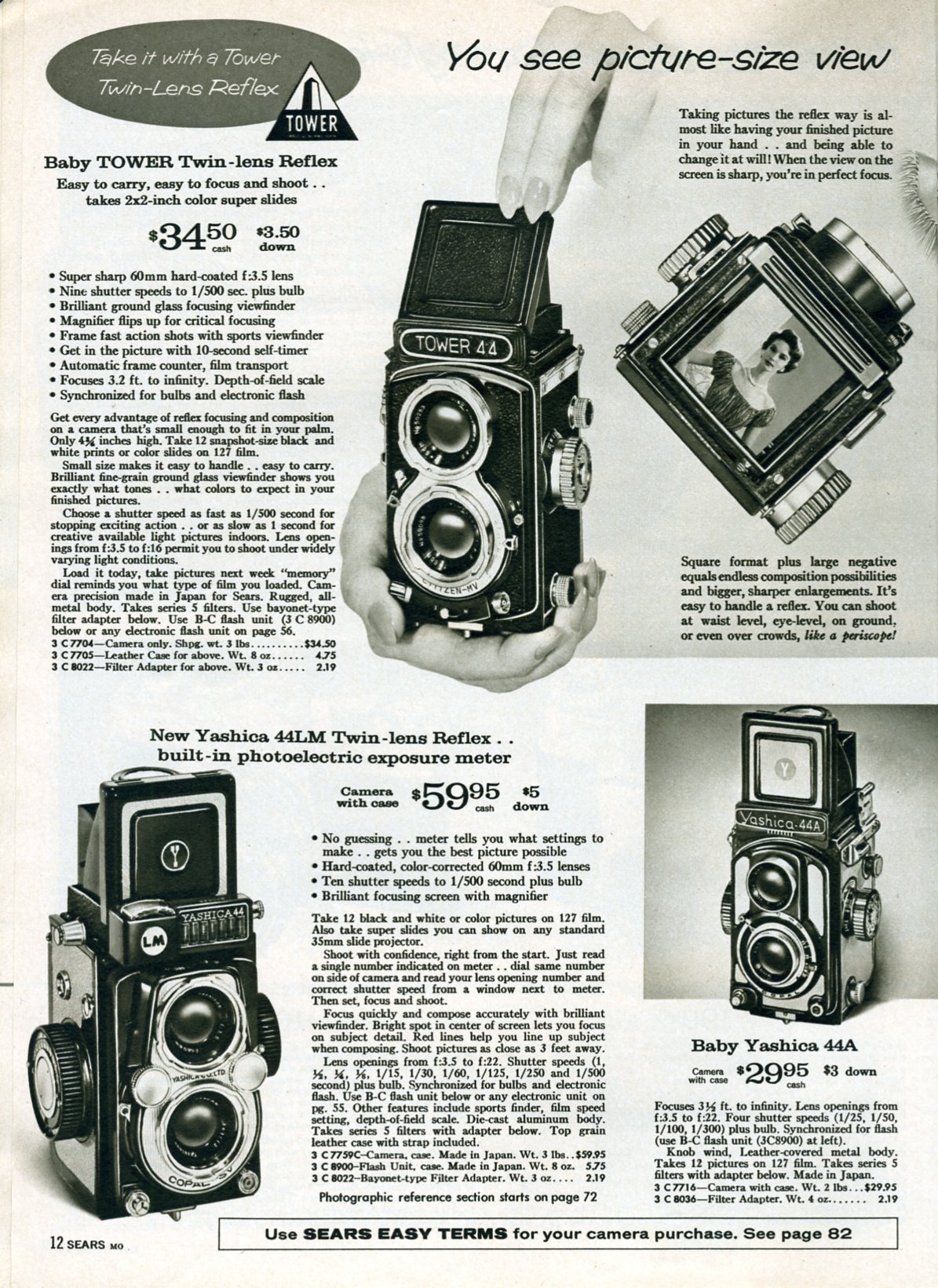 a newspaper with an old po and a hand holding up a camera