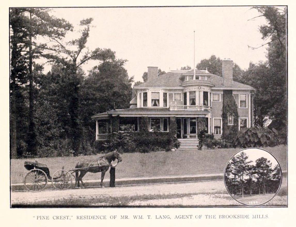 black and white po of an old home in a country town