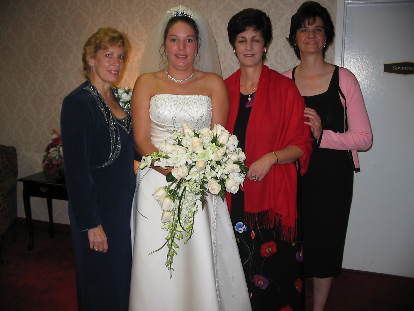 women are posing with one another for a picture