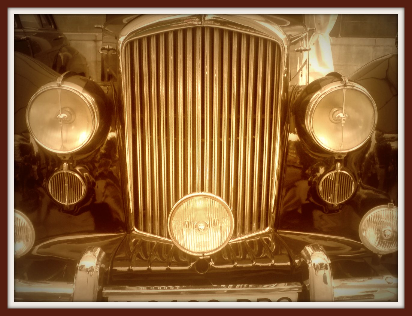 a vintage style car headlight with three headlights