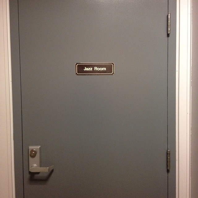 the door to a restroom with the name of jack room on it