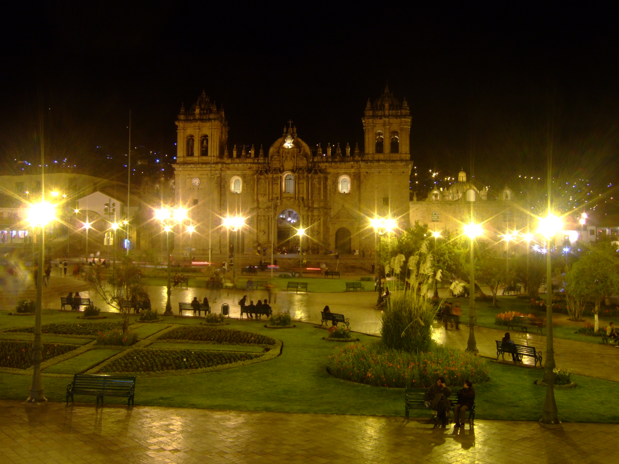 a city square at night with many lights