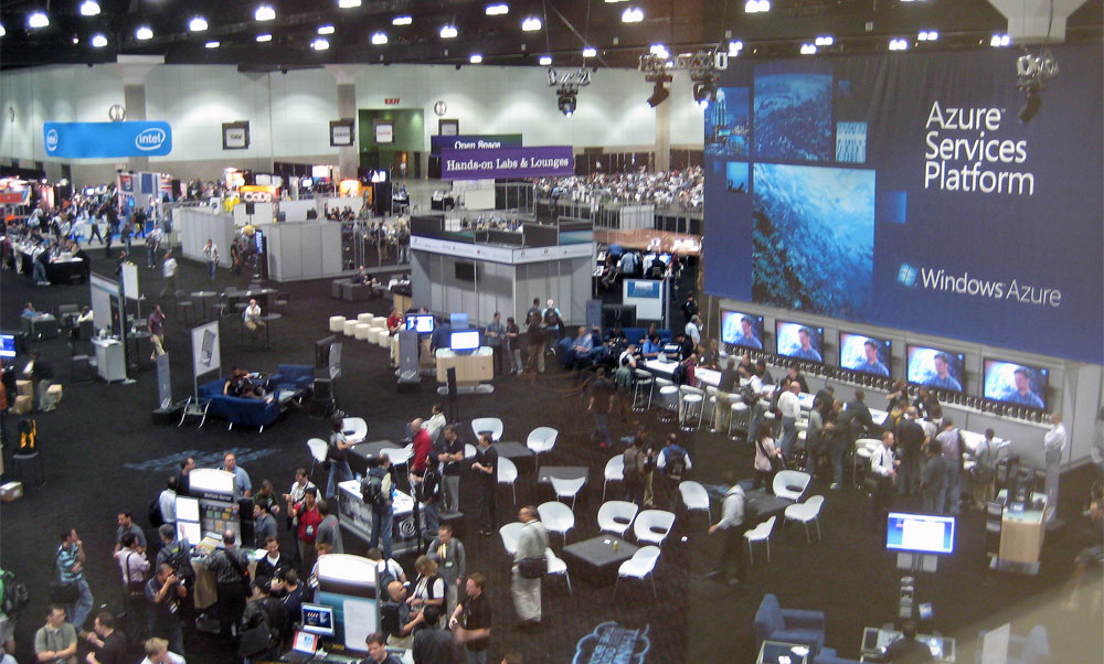 a po taken at an expo show from above, with people standing in the center