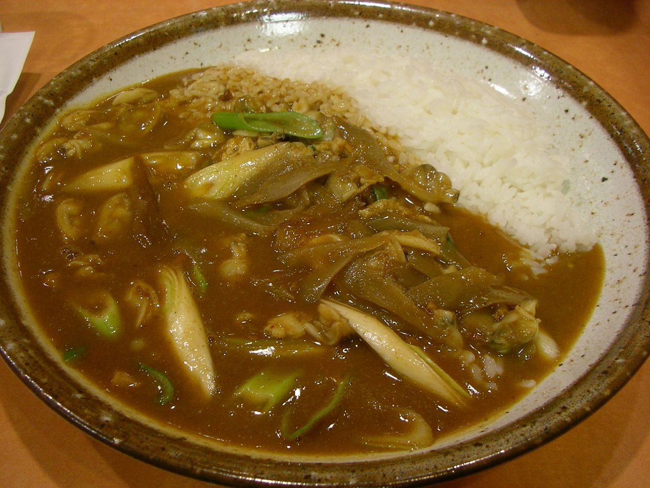 this dish has many different vegetables and rice in it