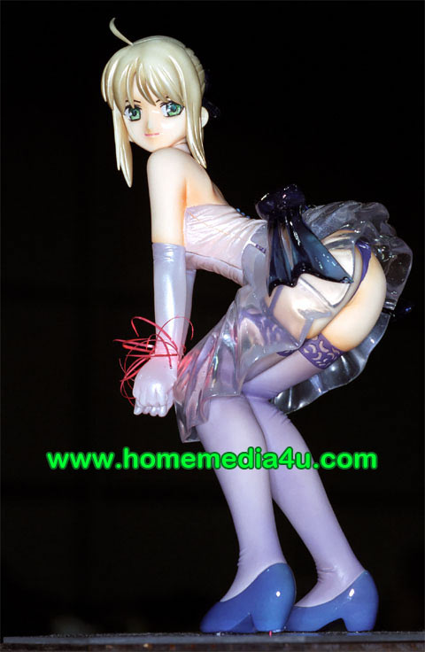 a toy woman wearing white and blue stockings and heels