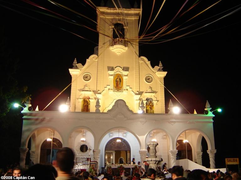 people gathered at an outdoor concert to attend