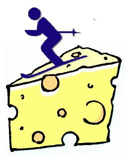 a man is on the edge of a big block of cheese