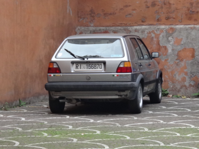 car parked on the street with its door open