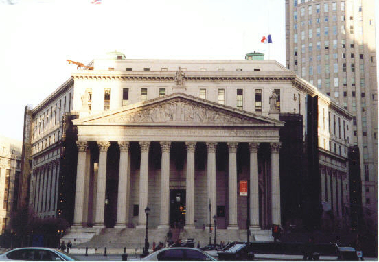 a very big nice looking building with many columns