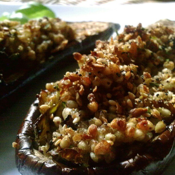 the stuffed eggplant has different toppings on it