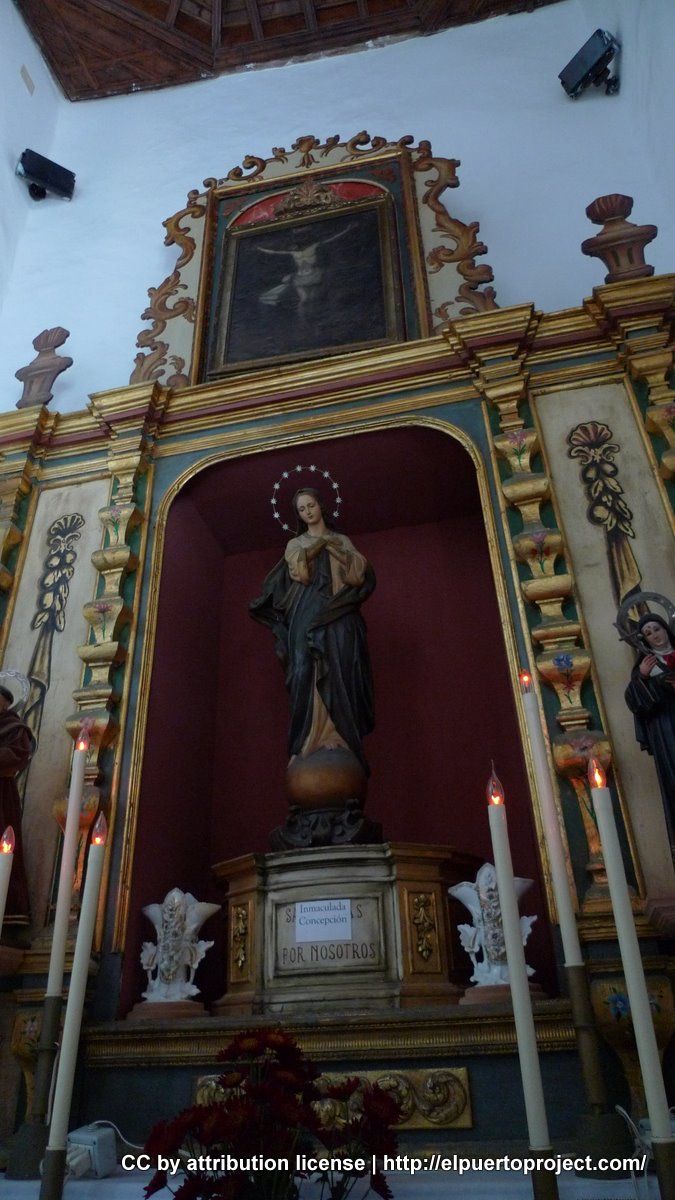 a church with a large statue in the middle