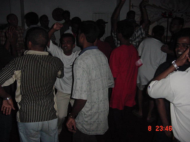 people dancing in a party on the dance floor