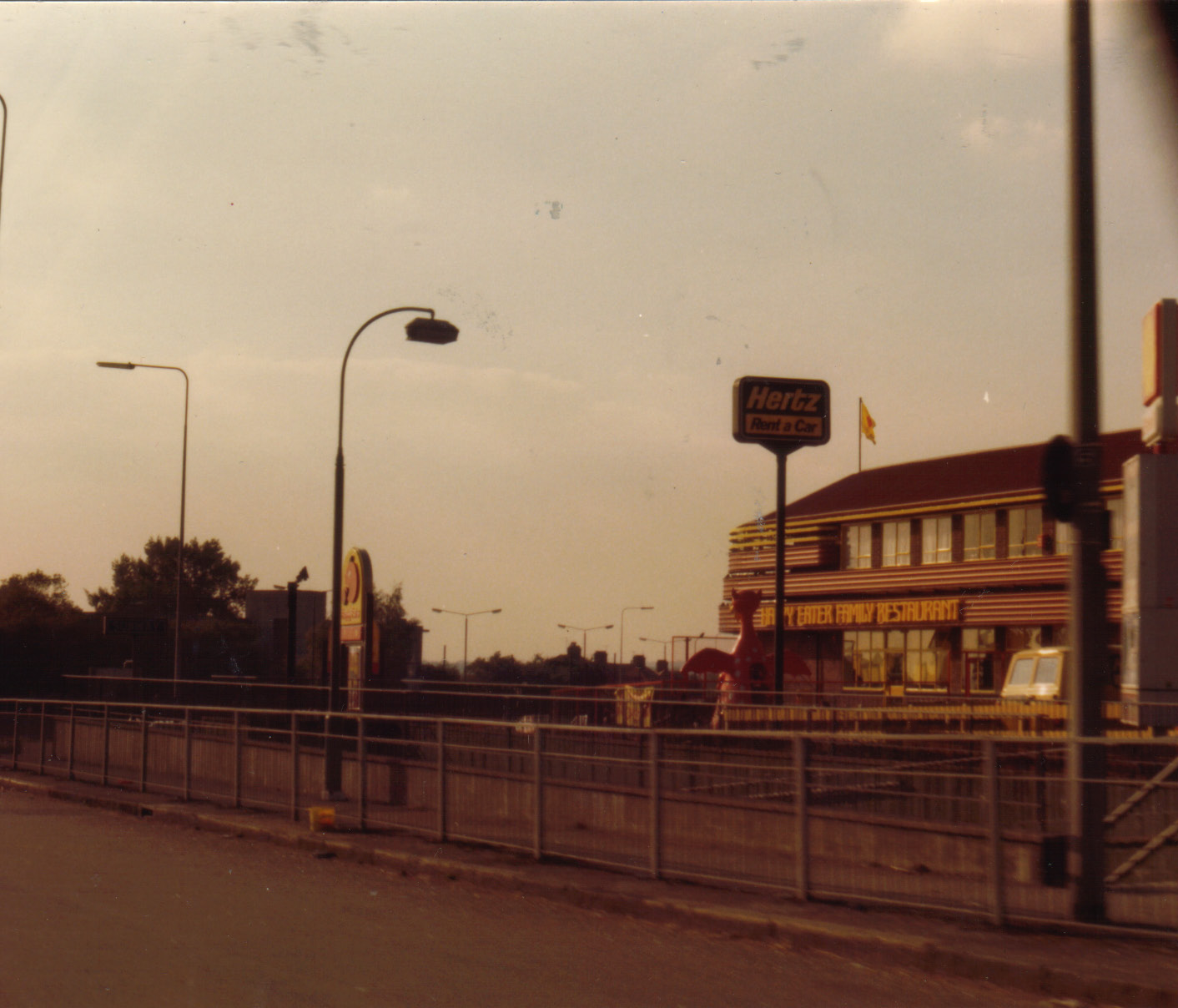 a empty street with a train station on it