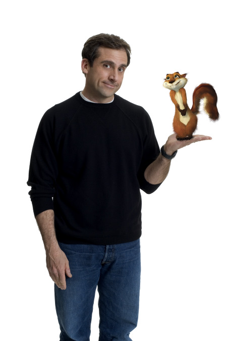 man holding small red squirrel holding the squirrel