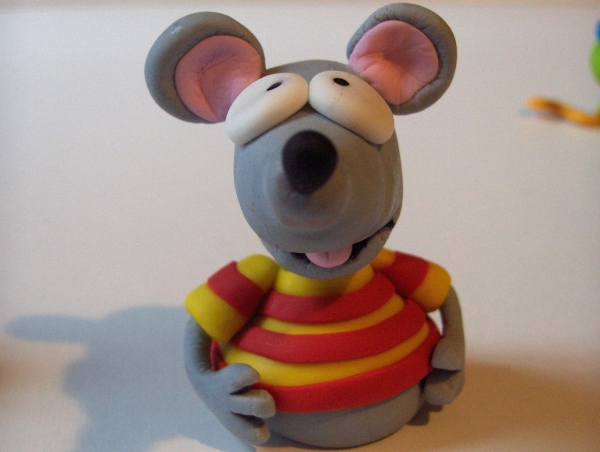 the figure is a grey mouse with yellow stripes