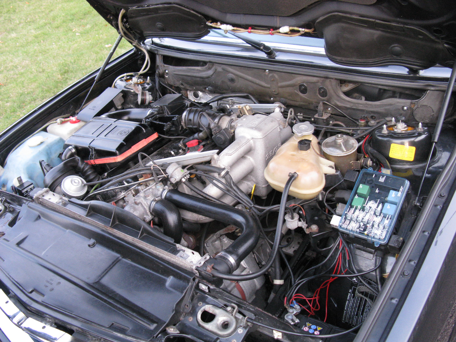 a engine compartment view of a car with the hood open