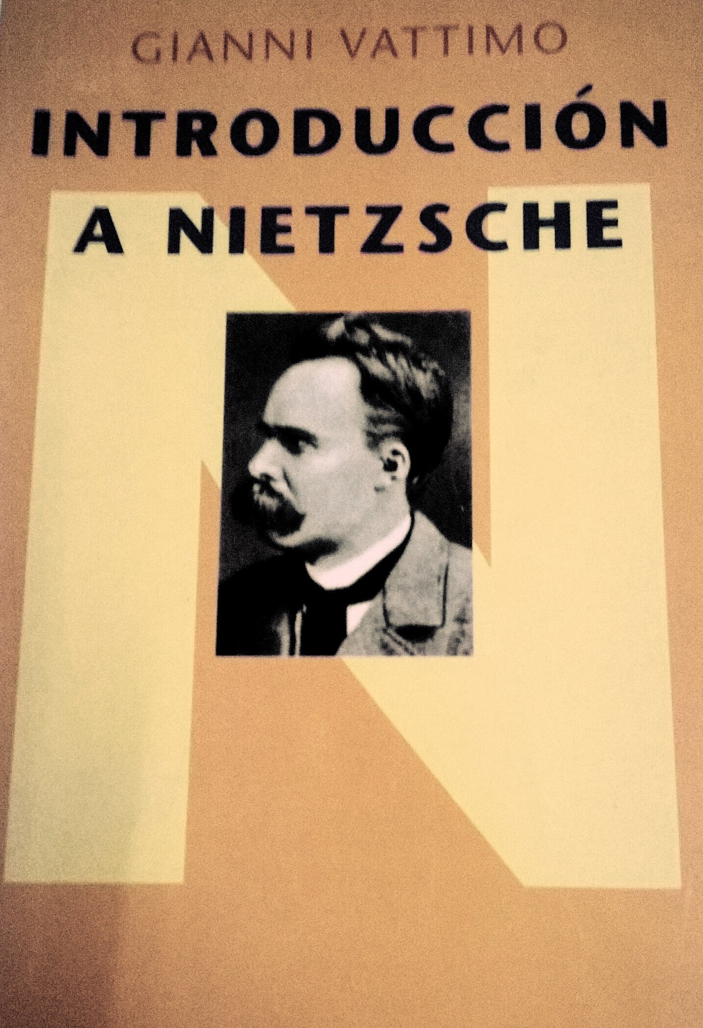 the cover of a book with a portrait of a man in front