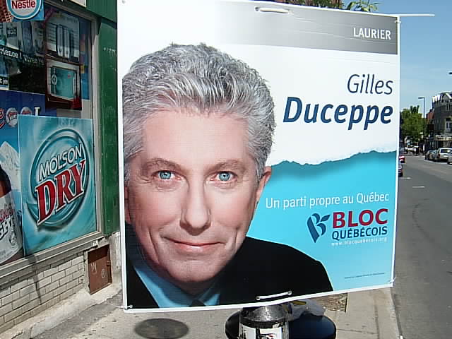 a poster in front of a store advertising a business