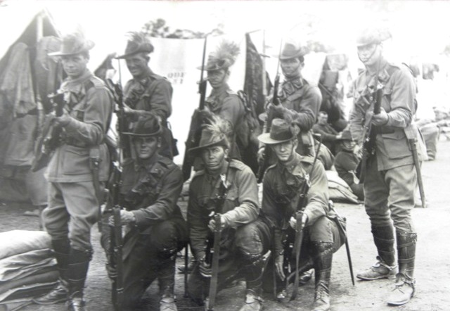 the old picture shows a group of soldiers with guns
