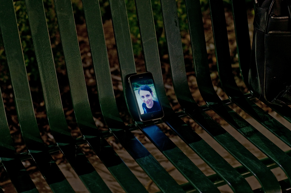 a cell phone that is on a bench