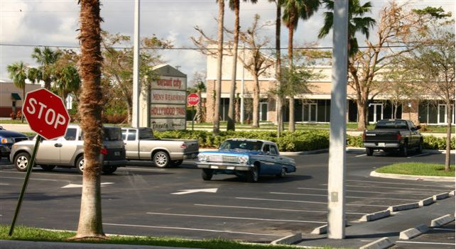 a stop sign in front of a store