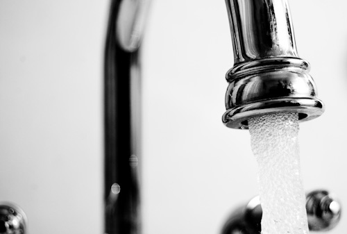 a black and white po of a faucet
