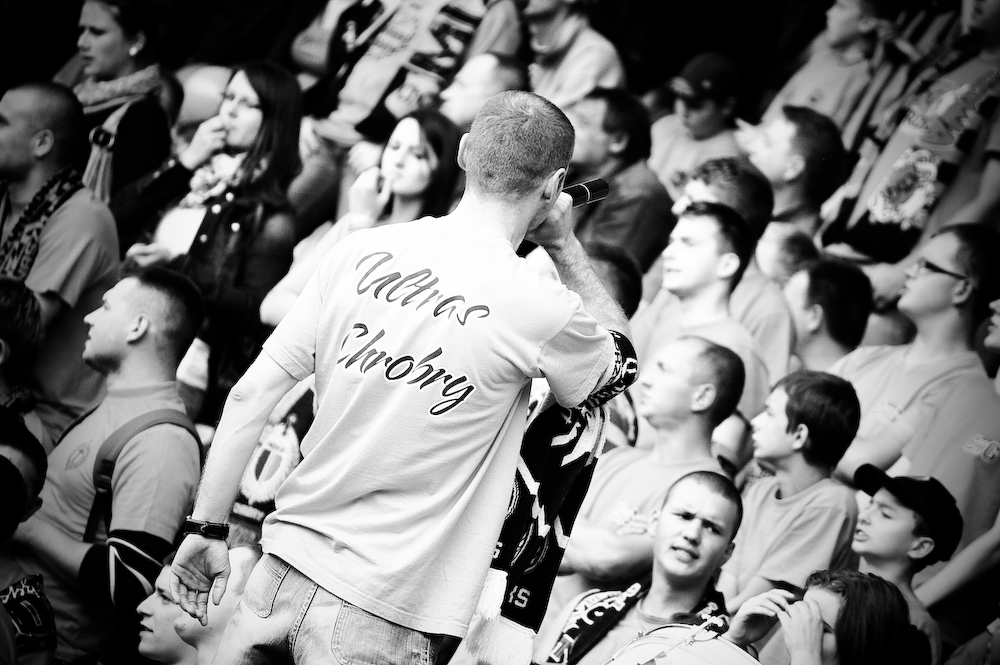 a male wearing a shirt that reads chicago wrong