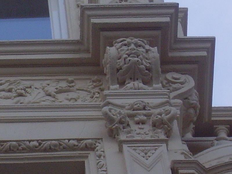 a close - up of the carvings on a building's exterior