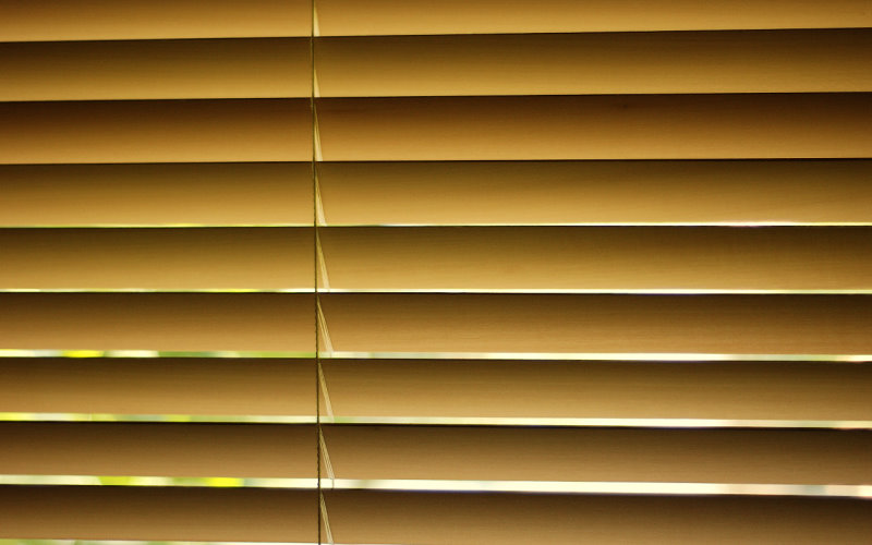 a window with blinds that are closed and closed