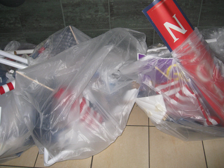 several bags full of toilet supplies lay together