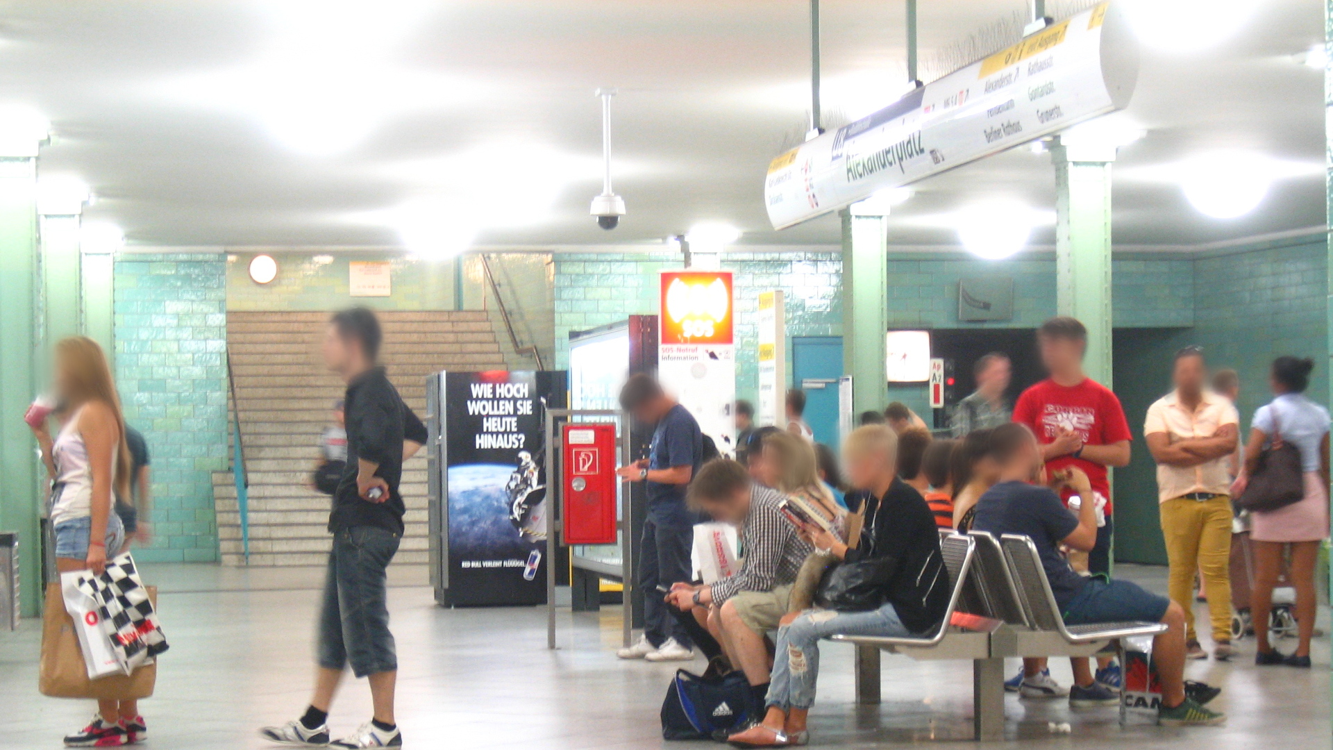 a group of people standing around in an area