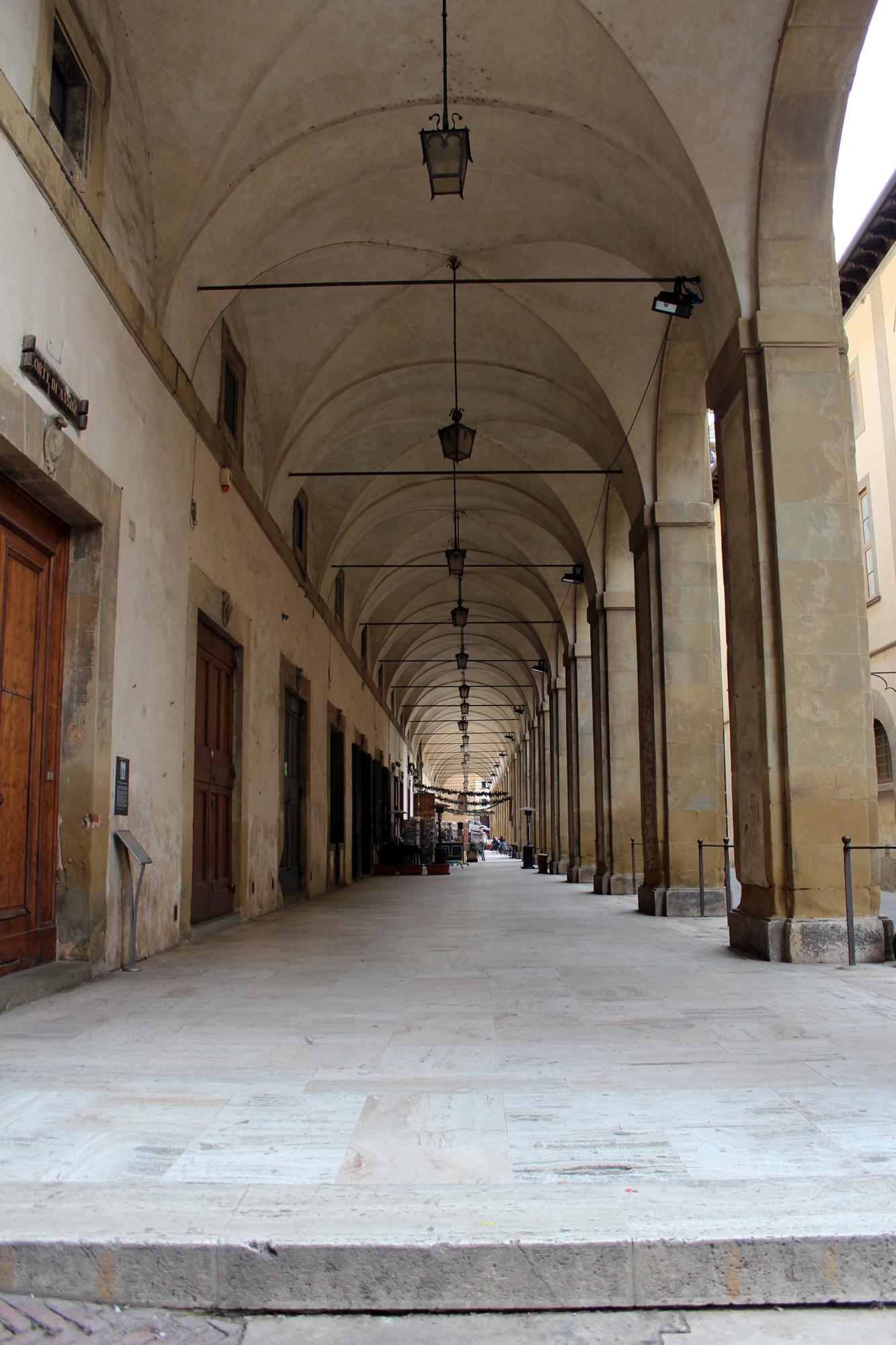 an image of a very long hallway in the city