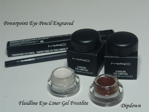 mac cosmetics cosmetics and brow powder on a white table