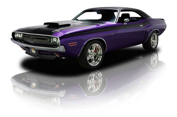 an old school muscle car is painted purple