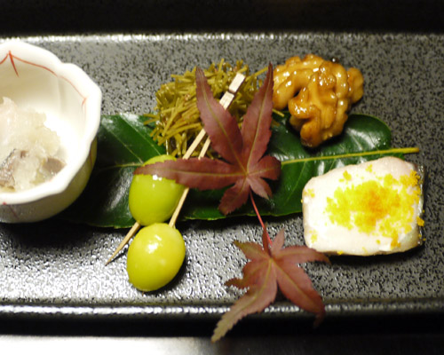 various kinds of food items on a serving tray