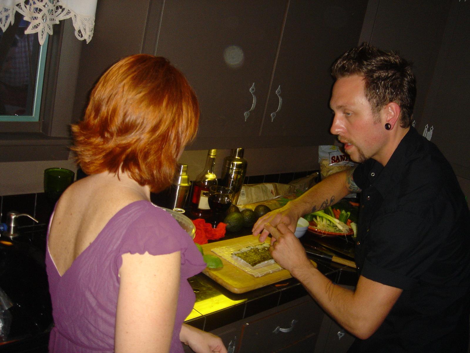 the woman is slicing vegetables for a meal