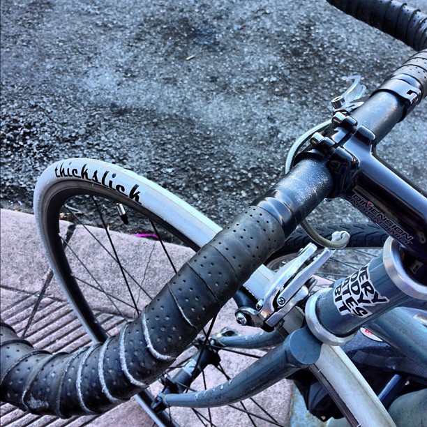 closeup of a bike that is parked on the street