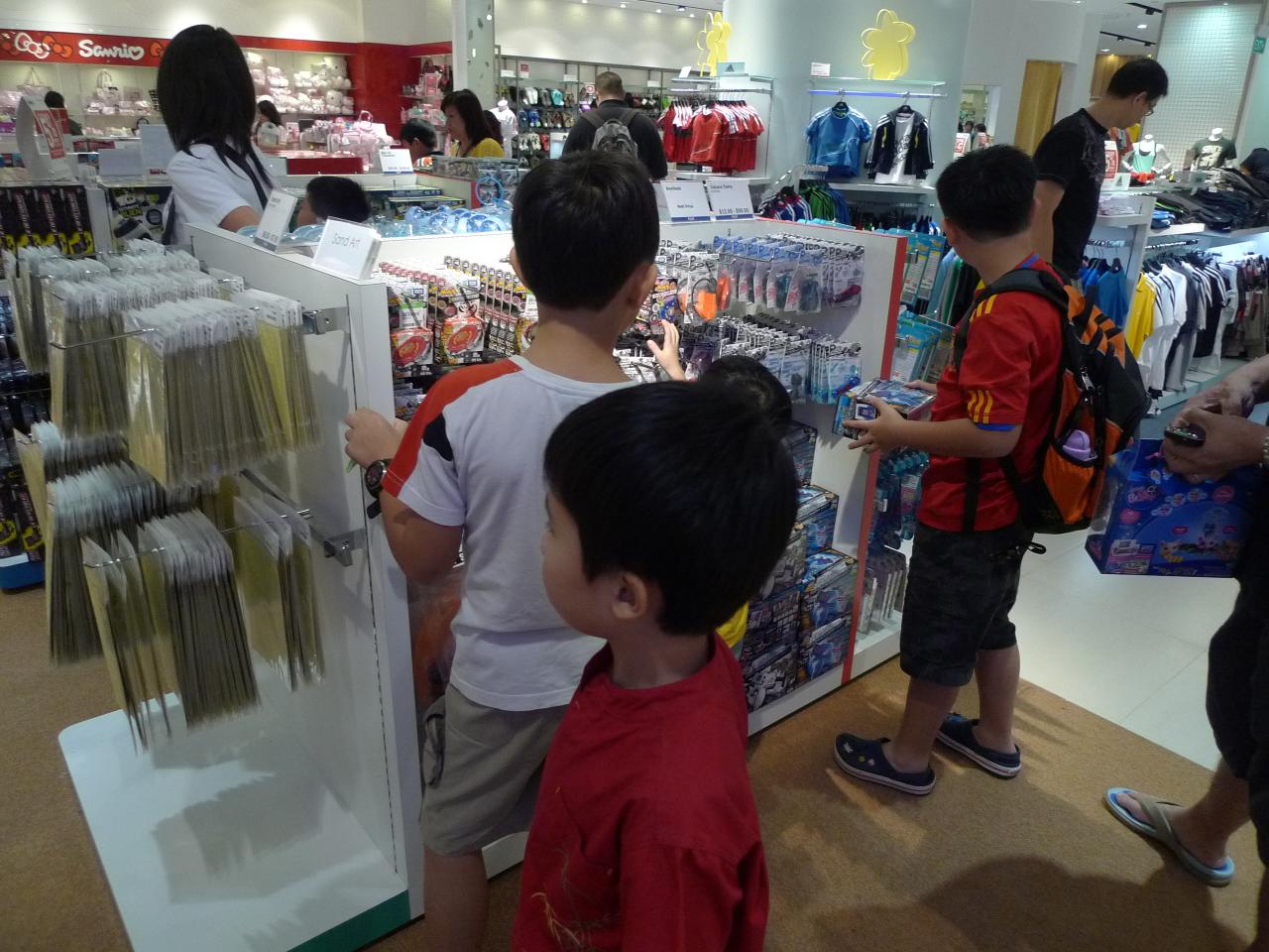 a group of s inside of a store with their teacher